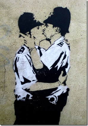 Banksy kissing policemen stencil  Brighton
