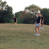 Scott and Stephanie in the outfield with another teammate.