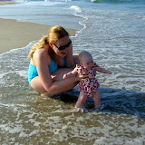 Lily's first dip in the ocean. (June)