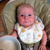 Lily's first attempt at rice cereal! (July)
