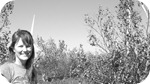 Jill, with a windmill behind her head.