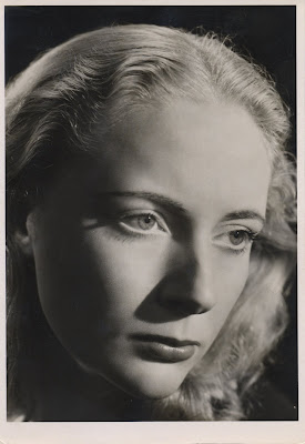 black and white photo of blonde white woman