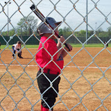 Tony III looks on as he waits for his turn to bat