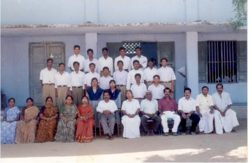 Mr.Anbu, in pink shirt Pravin in XII Standard