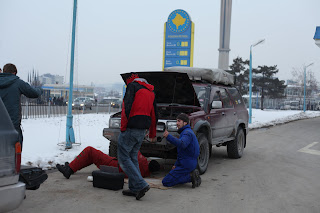 Replacing a corroded pipe on Finn, with help of Random Friendly Kosovan Man