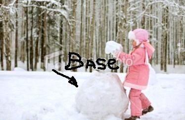 [ist2_11214602-child-making-snowman[3].jpg]