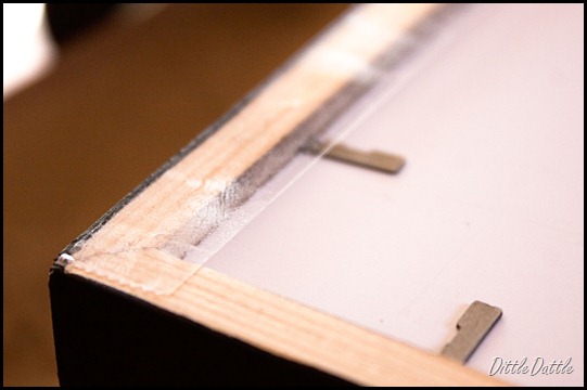 Attaching-paper-back-to-frame