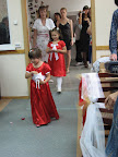 The flower girls spreading flowers...they later aked why they had to throw flower petals on the ground ;)