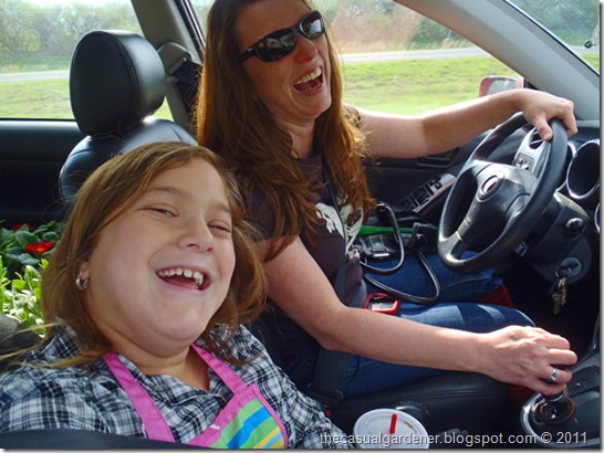 Shawna Coronado and kiddo laughing on road trip to Carolees Herb Farm.