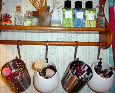 Hanging storage for makeup brushes, mineral makeup, mascaras, and eyeliners - shelf storage for favorite perfumes
