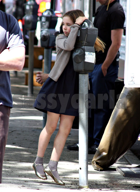 Ruby Jerins plays with the parking meter while waiting for Robert Pattinson on July 8, 2009
