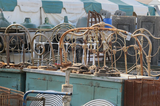 A common site at Brimfield? A myriad of antique wrought-iron beds.