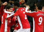 Arsenal come from two down to beat Bolton and go top