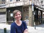 Cory is laughing because we thought that taking a photo with an ugly background in a pretty city was funny. Which it is.