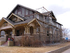 Front and side of house with painted trim