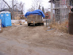 Wide view of post apocalyptic back yard
