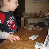 Erik doing a baseball matching game I made for him