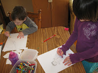 Madeline\'s invented game involved making soccer player paper dolls...