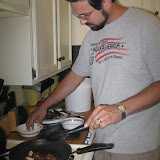 Tony cooks up the kids catch of fish