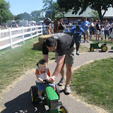Kai on the tractor at Little Hands on the Farm