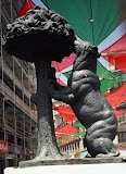 A statue of a bear eating a madroño tree near the Puerta del Sol in Madrid.