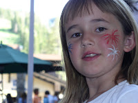July 4th 2006 - 29 — 4th of July at cabin.  The year we went to Squaw Valley to watch fireworks for the first time.
At Squaw Valley: Emily getting her face painted.