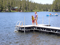 July 4th 2006 - 10 — 4th of July at cabin.  The year we went to Squaw Valley to watch fireworks for the first time. Patrick and Emily on the dock.