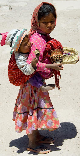 tarahumara_girl_carrying_her_brother.jpg