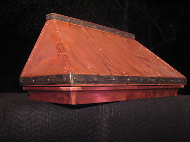 rustic custom fabricated copper hood, decorative copper hood, rustic custom copper hood with iron strap accents by The
                                             Metal Shoppe, the custom copper hood specialists