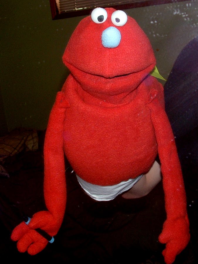 Fuzzy Hijinx Puppets Round Orange Puppet