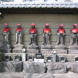 Outside a Fukagawa graveyard: Buddhas dressed up for Spring Equinox Day