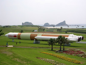 A life-size replica of a HII-A rocket, at the Tanegashima Space Center. That's Kai and Eidan running to check it out.