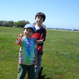 Eidan and Kai flying a kite at Brenton Point in Newport