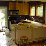 I cut the countertops to fit the cabinet configuration, with a bar counter on the dining room side