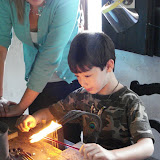 Kai tries his hand at bead making