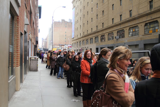 Braving the cold, shoppers stand in line for the sale