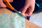 Clip the corners to make them less bulky. Clip the corners to make them less bulky.