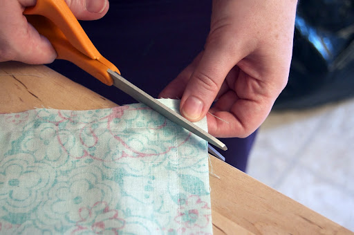 Clip the corners to make them less bulky. Clip the corners to make them less bulky.