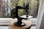 Anne brought this antique Singer sewing toy for everyone to see. The toy was designed for kids to sew alongside their mothers. Anne brought this antique Singer sewing toy for everyone to see. The toy was designed for kids to sew alongside their mothers.