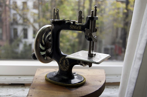 Anne brought this antique Singer sewing toy for everyone to see. The toy was designed for kids to sew alongside their mothers. Anne brought this antique Singer sewing toy for everyone to see. The toy was designed for kids to sew alongside their mothers.