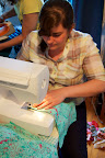 Jessica sews her accessory case. Jessica sews her accessory case.