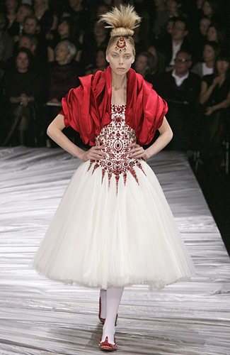 Dress of ivory silk tulle embroidered with red glass crystals; bolero of red silk (The Girl Who Lived in the Tree - Fall/Winter 2008-2009) Dress of ivory silk tulle embroidered with red glass crystals; bolero of red silk (The Girl Who Lived in the Tree - Fall/Winter 2008-2009)
