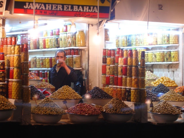 An olive seller. Just look at the selection.