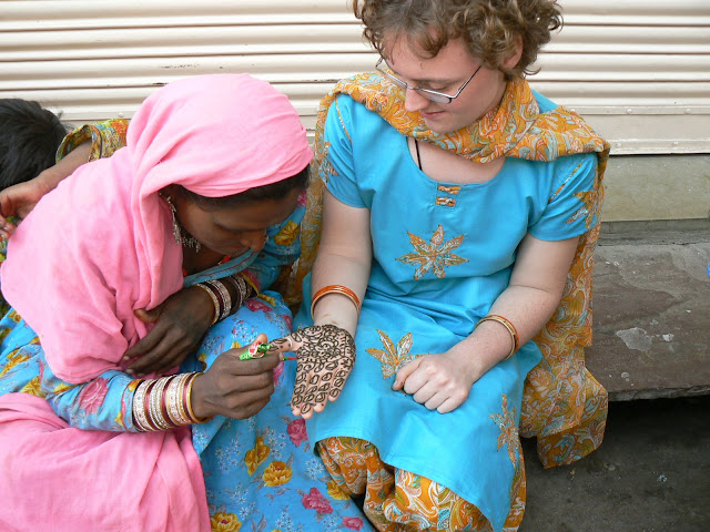 Lydia gets a henna job she didn't ask for by shaking someone's hand.