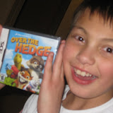 Michael opens his Thrap gift, a DS game!