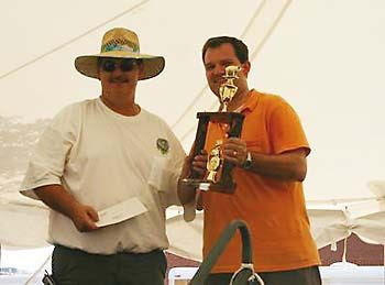Tim Patton of Swampsauce Smokers receiving his Reserve Grand Champion trophy at the 2006 Greenwood, SC contest.