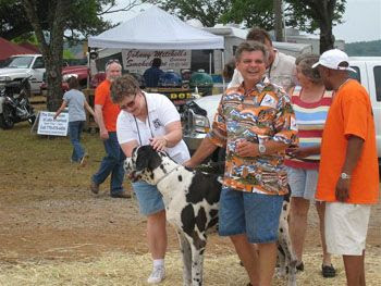 Kathy Brazier &amp; Steve Ownby playing with a BIG dog. – Cartersville, Ga June 2007