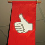 “I commit” thumbs up.