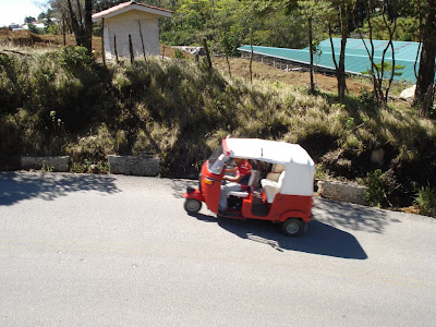 Every now and again, we saw these cute little three-wheeled things like smart-cars.