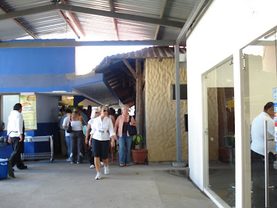 OK, this is the AIRPORT.  Liberia Airport in Costa Rica is open-air, even after security.  Sure, they have fences.  But it was nice not to be breathing recycled air for the three hours they want you to wait for international flights.